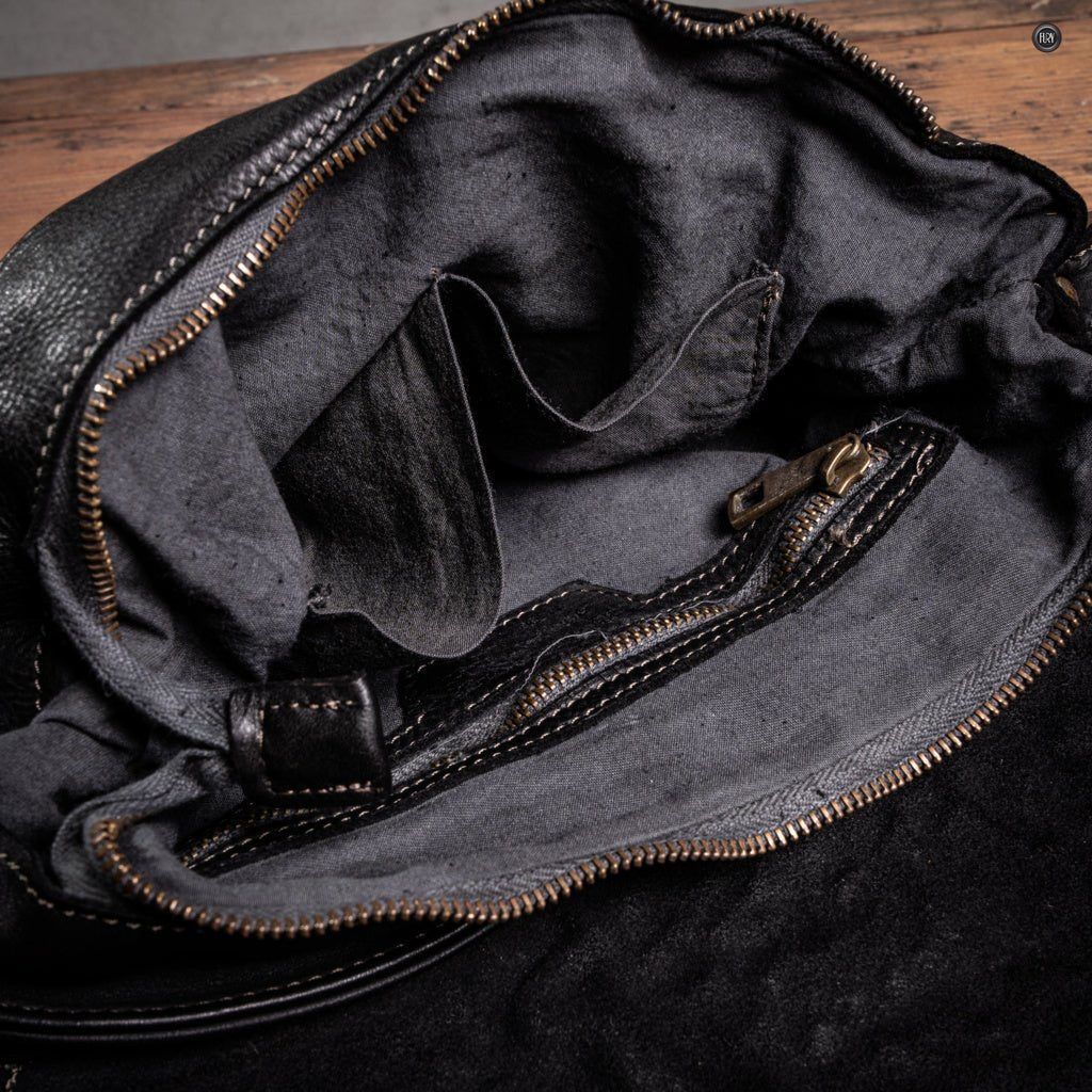 Borsetta Antea in pelle intrecciata