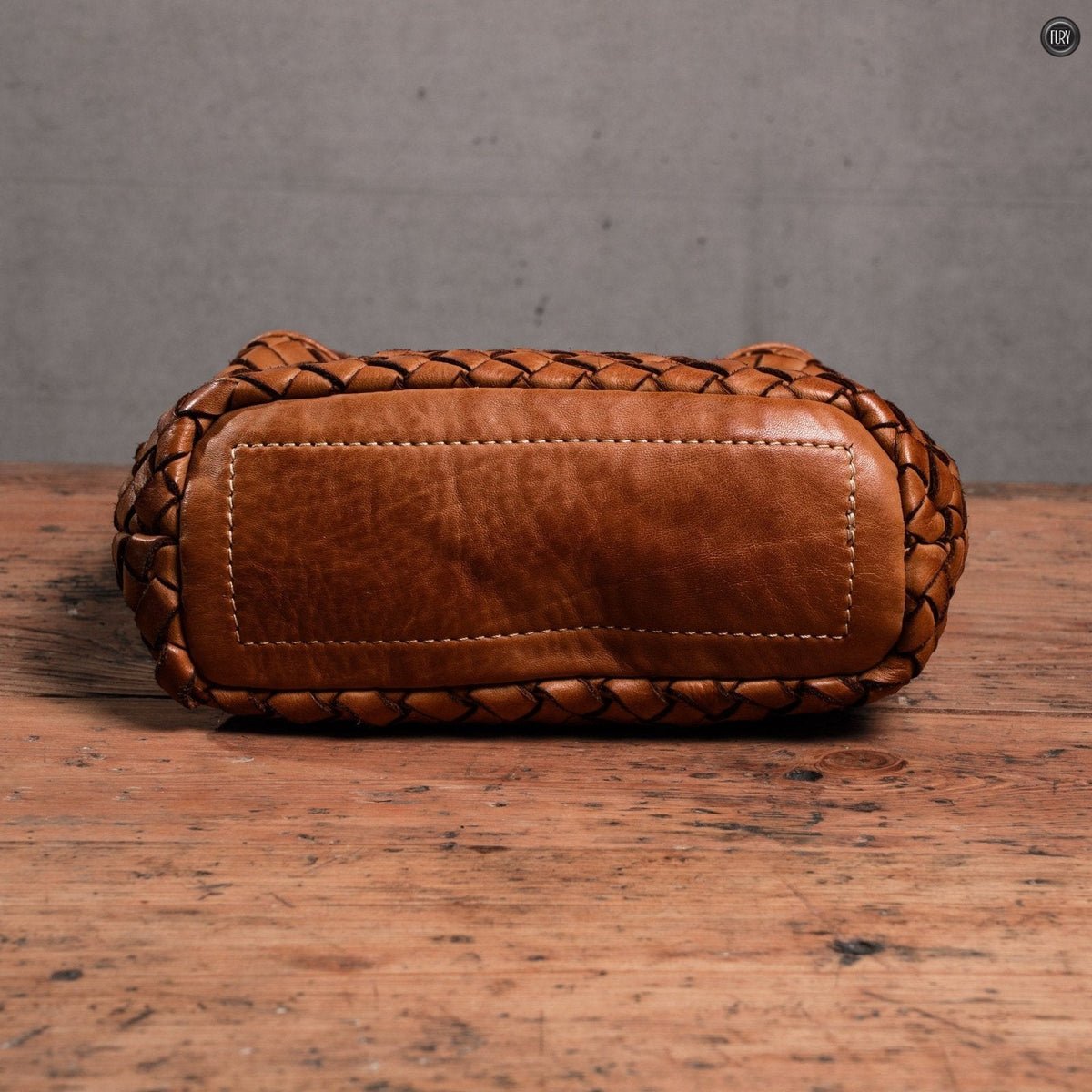 Borsetta Sibilla in pelle intrecciata
