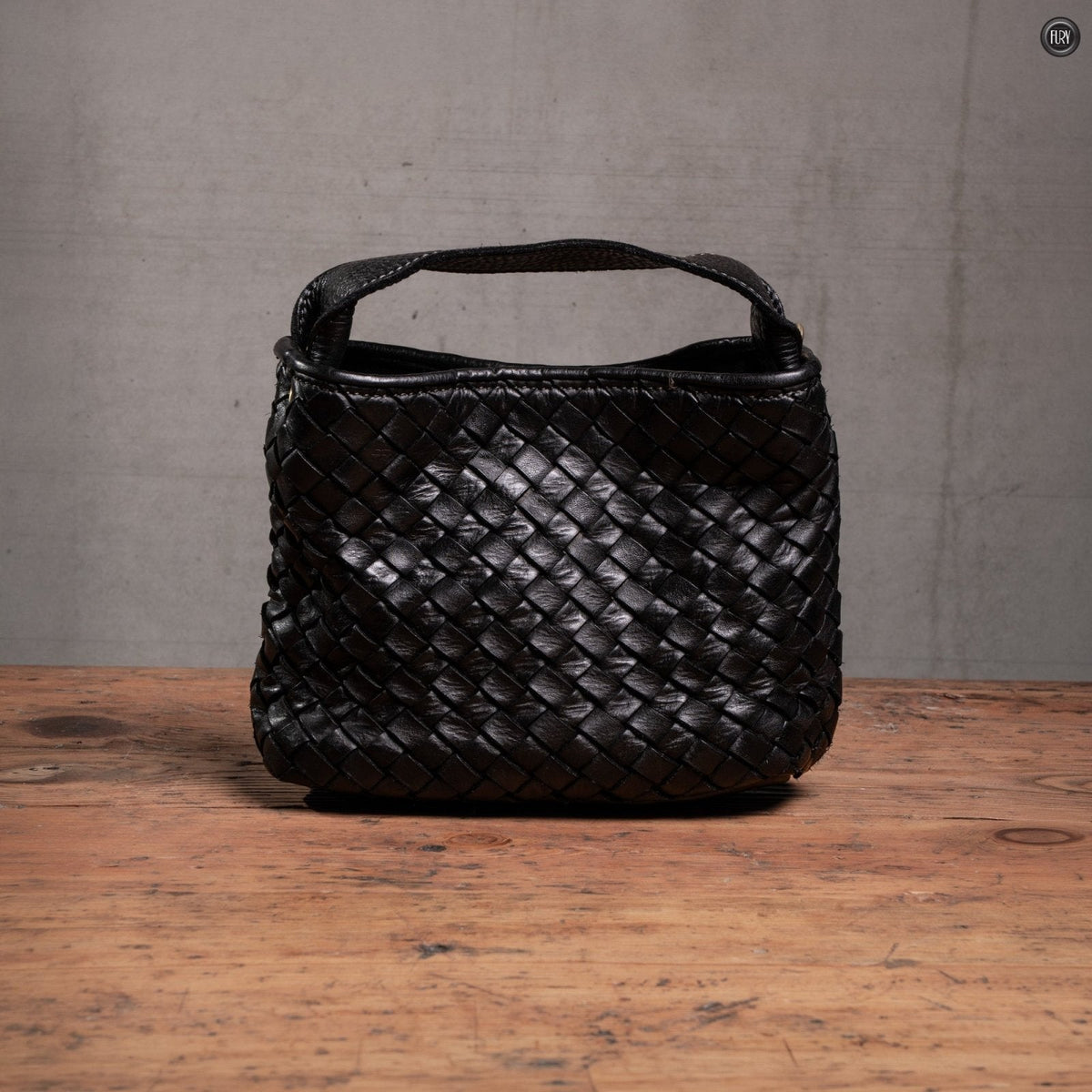 Borsetta Sibilla in pelle intrecciata