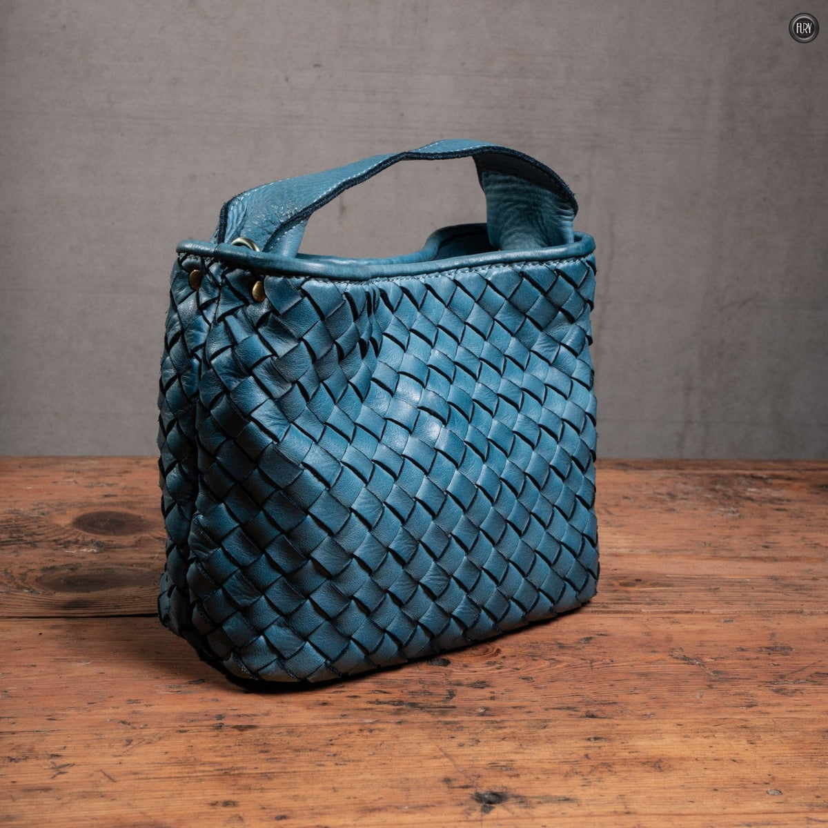 Borsetta Sibilla in pelle intrecciata