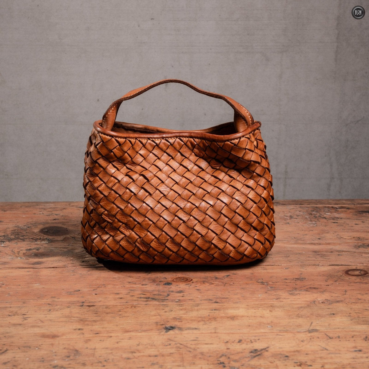 Borsetta Sibilla in pelle intrecciata