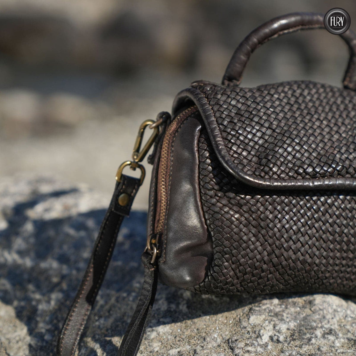 Borsetta Siena in pelle intrecciata