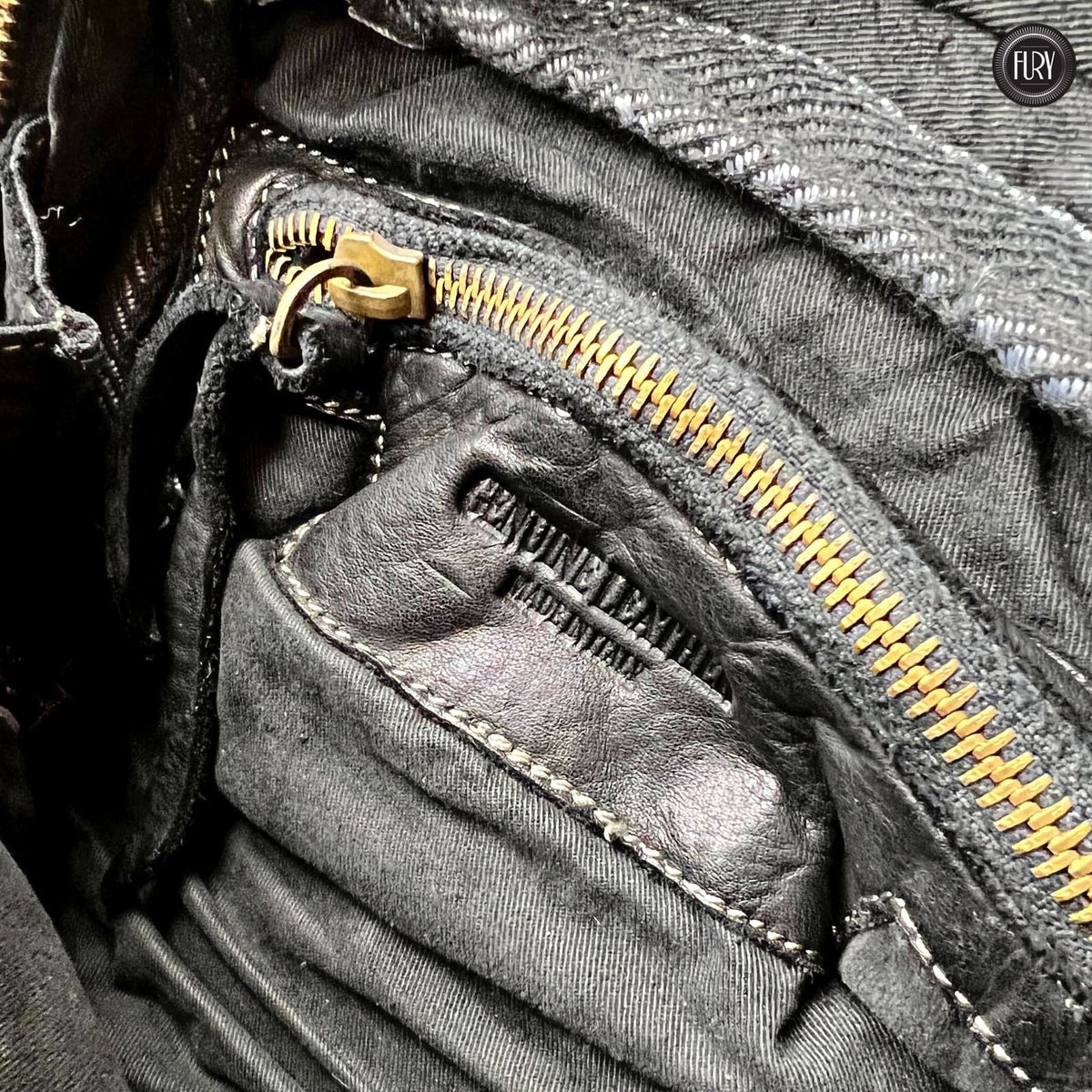 Borsetta Siena in pelle intrecciata