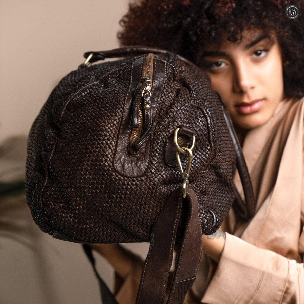 Borsone Magellano in pelle intrecciata