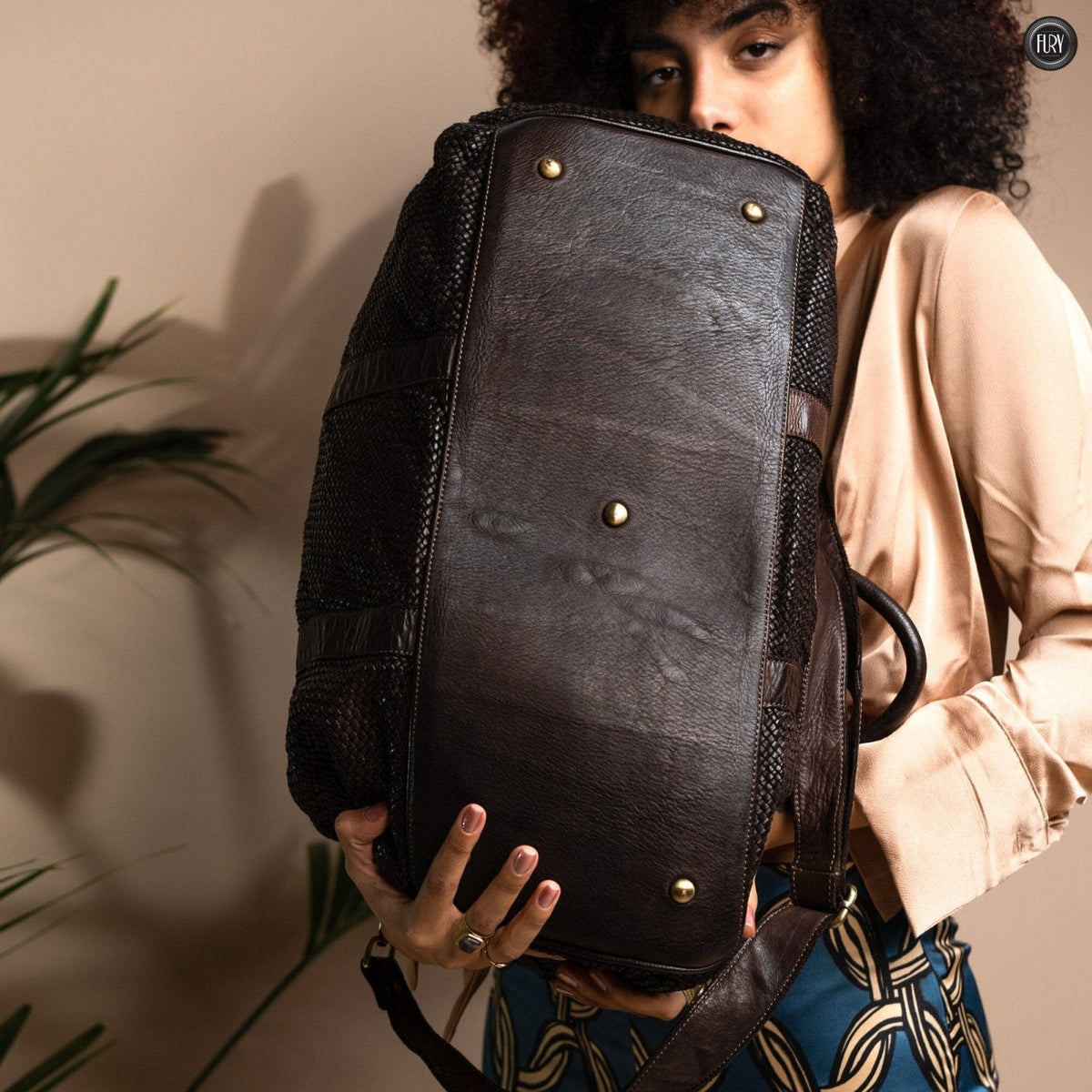 Borsone Magellano in pelle intrecciata