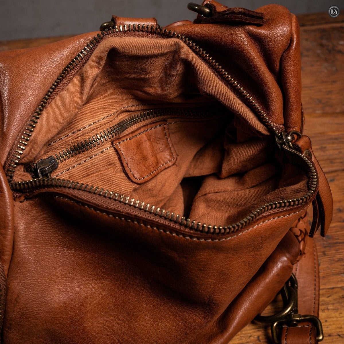 Zainetto Volterra reversibile in pelle intrecciata