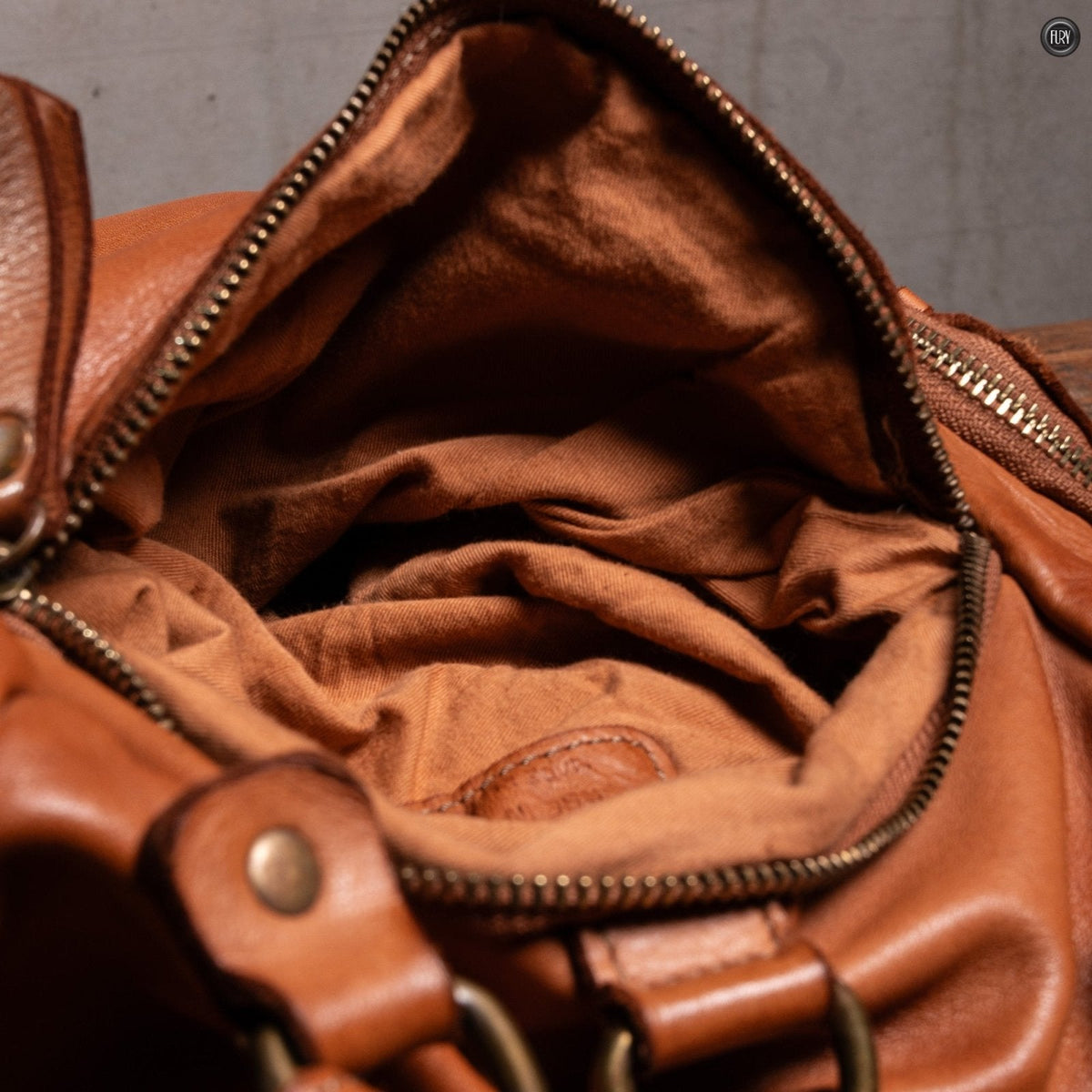 Zainetto Volterra reversibile in pelle intrecciata